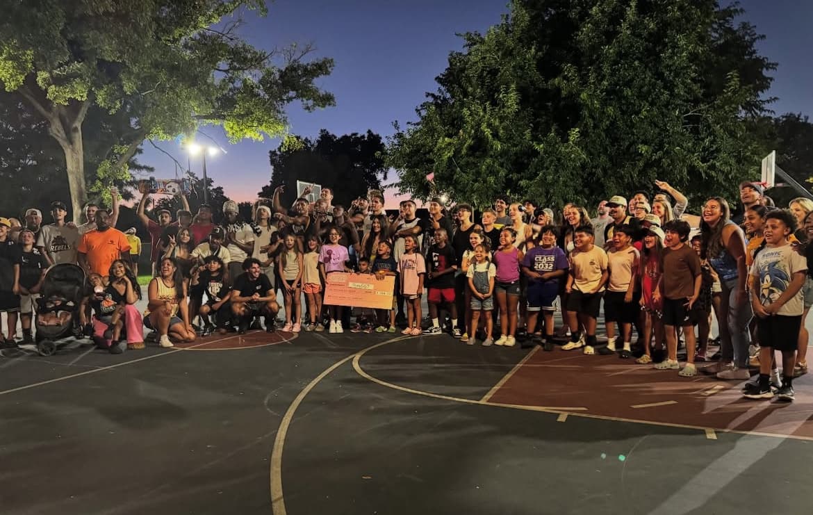 Community gathering at the Scoop Dreams basketball tournament